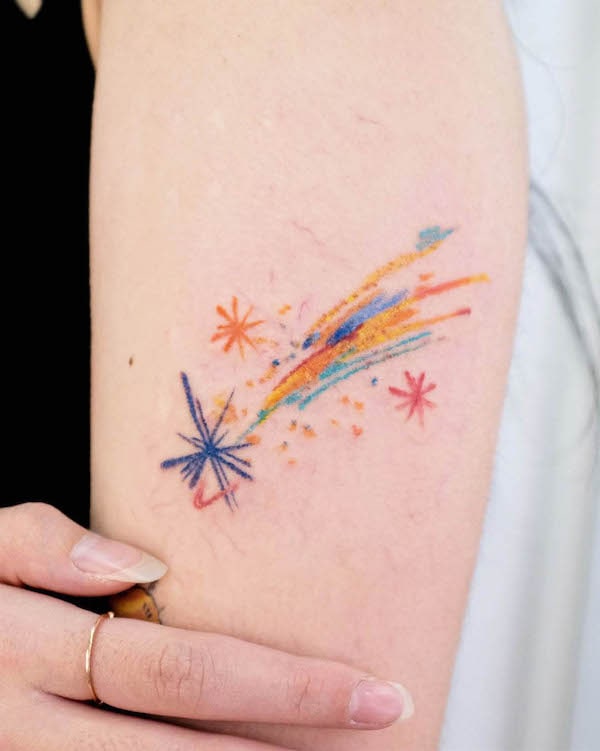 Colorful shooting star tattoo by @vitchin_tattoo