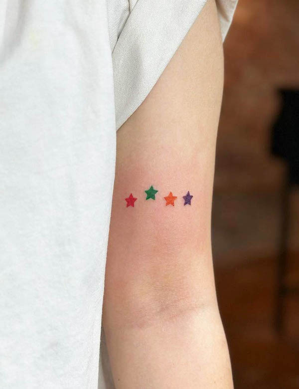 Colorful star tattoo by @3.ink