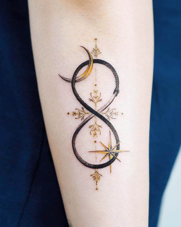 Infinity ouroboros star and moon tattoo by @norangtattoo