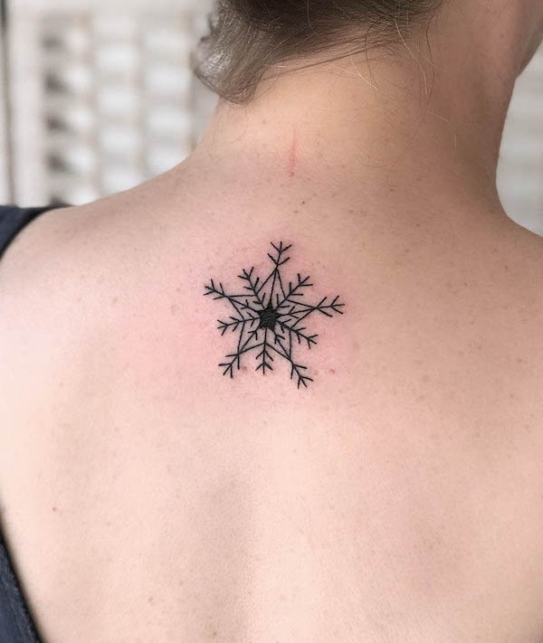 Snowflake star tattoo by @lucietattoo