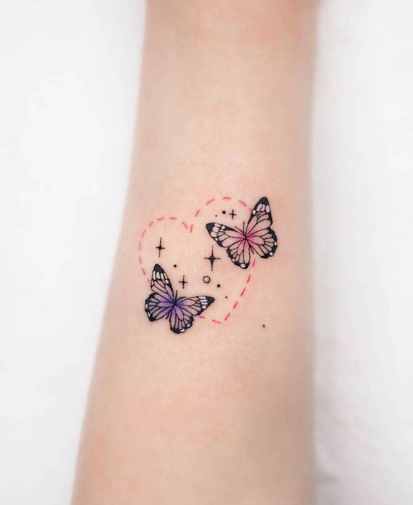 Star and butterfly tattoo by @malang.ttt