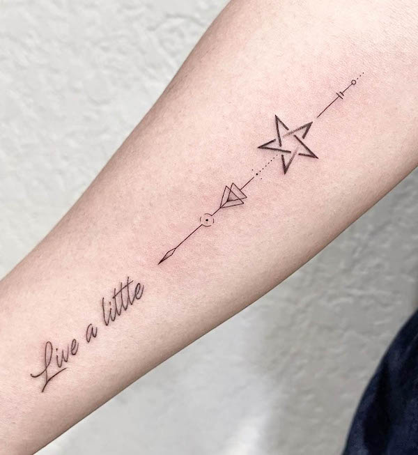 Star tattoo with inspiring quote by @tsai_tattoo