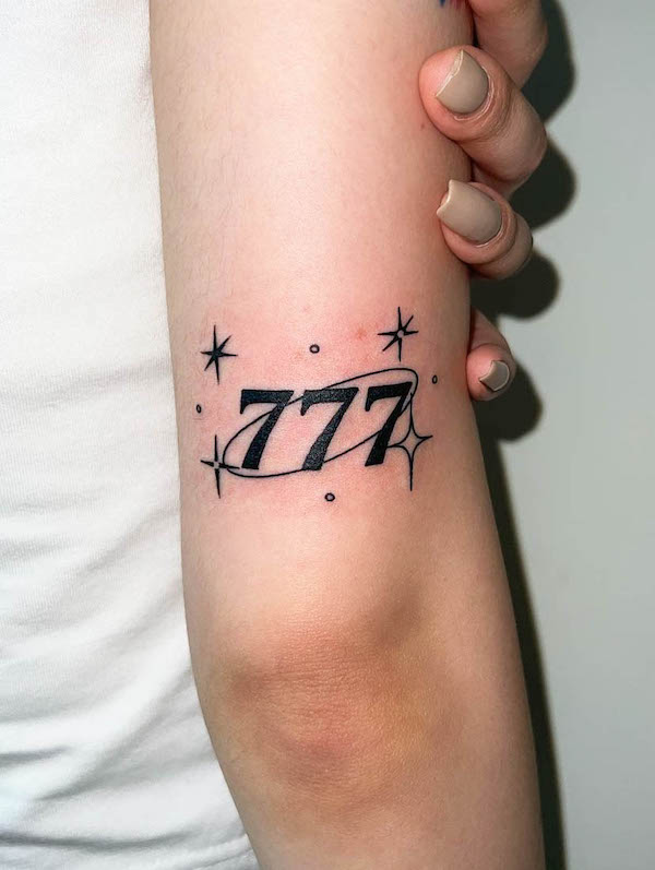 777 angel number tattoo by @bbibbiclub.kr