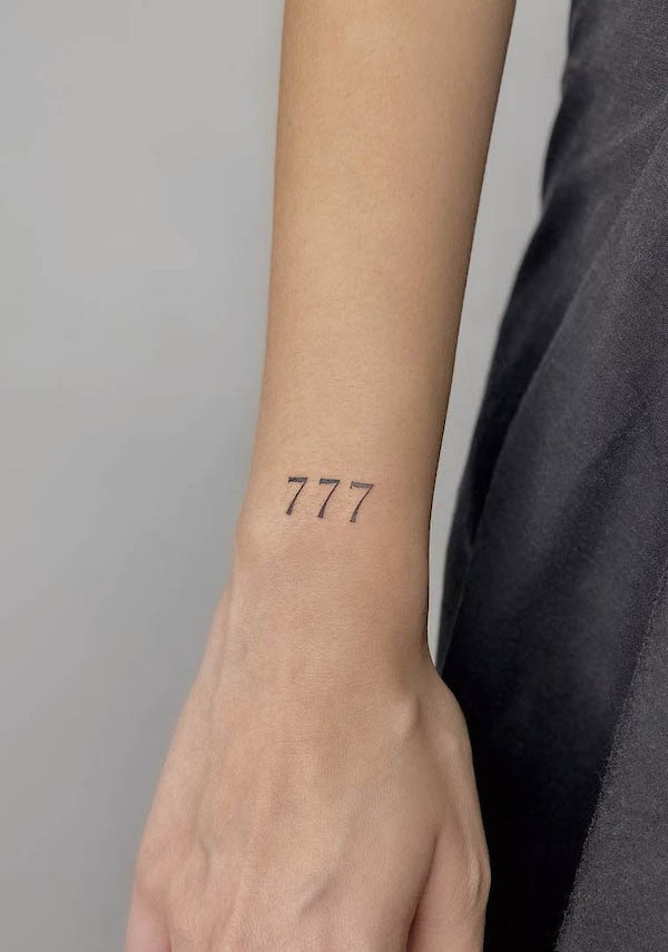 777 angel number tattoo by @gokce.karahasan