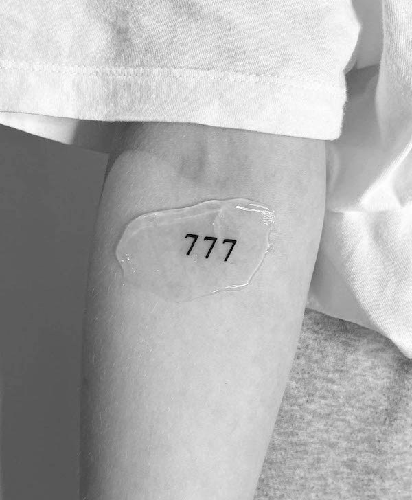 777 angel number tattoo by @lisa_delia