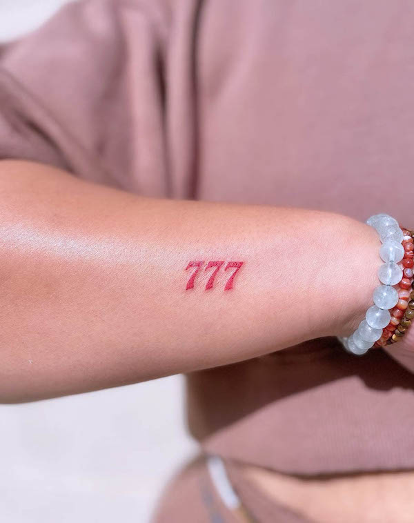 777 angel number tattoo by @vibetattoo.ut