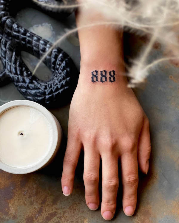 888 angel number tattoo by @king.ink