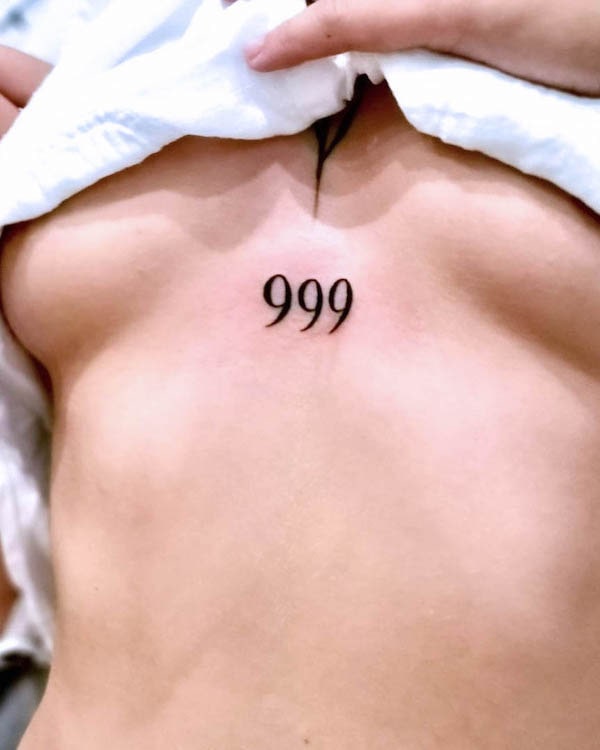 999 angel number tattoo by @funky_tattoo_bucuresti