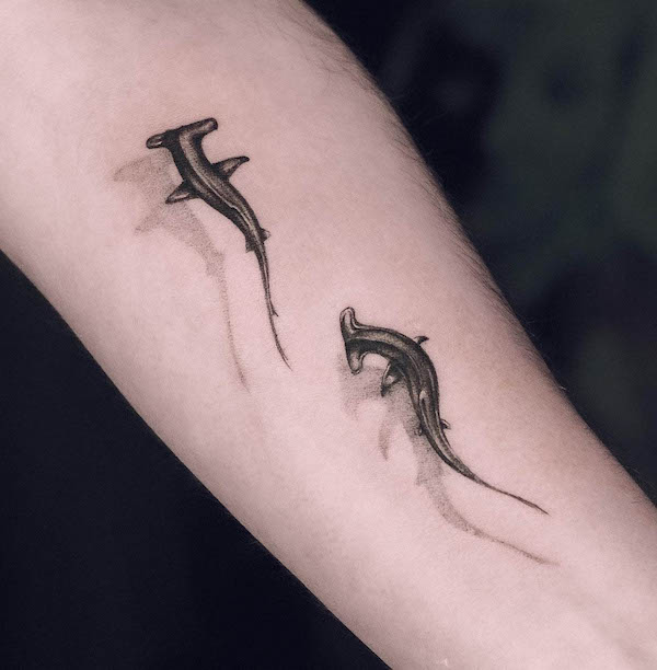 A pair of hammerhead shark tattoo by @sonatserin