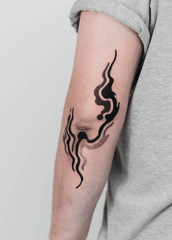 Abstract wave elbow tattoo by @nxe_xiner