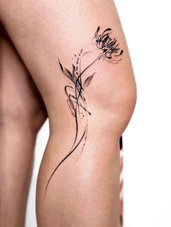 Abstract spider lily leg tattoo for women by @mukyeon_tattoo
