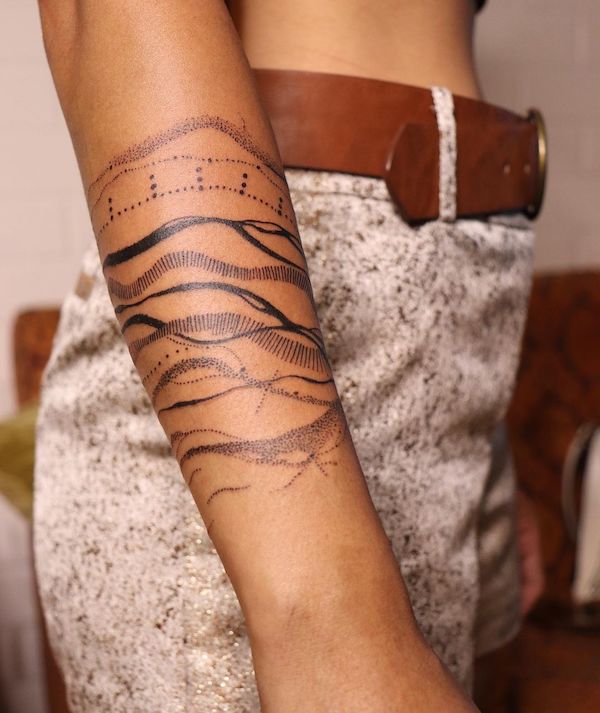 Abstract water forearm tattoo for women by @aniramchi