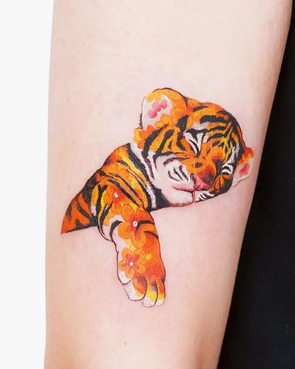 Adorable baby tiger by @fluffy_tattoo.jpg