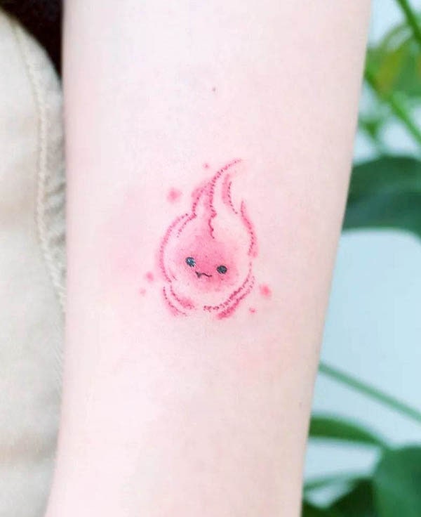 Adorable fire tattoo by @haenal_tattoo