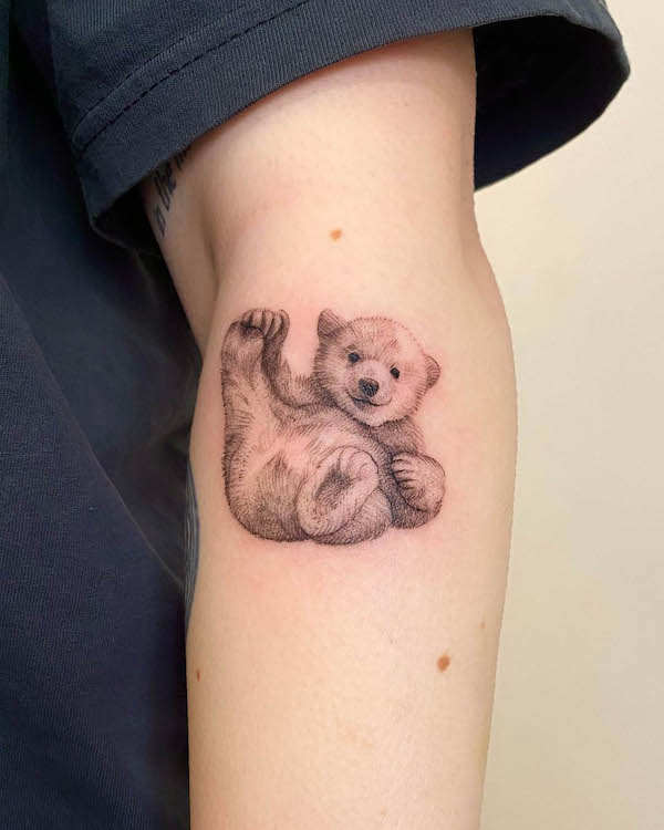 Adorable realism cub tattoo by @alchemytattoomelbourne