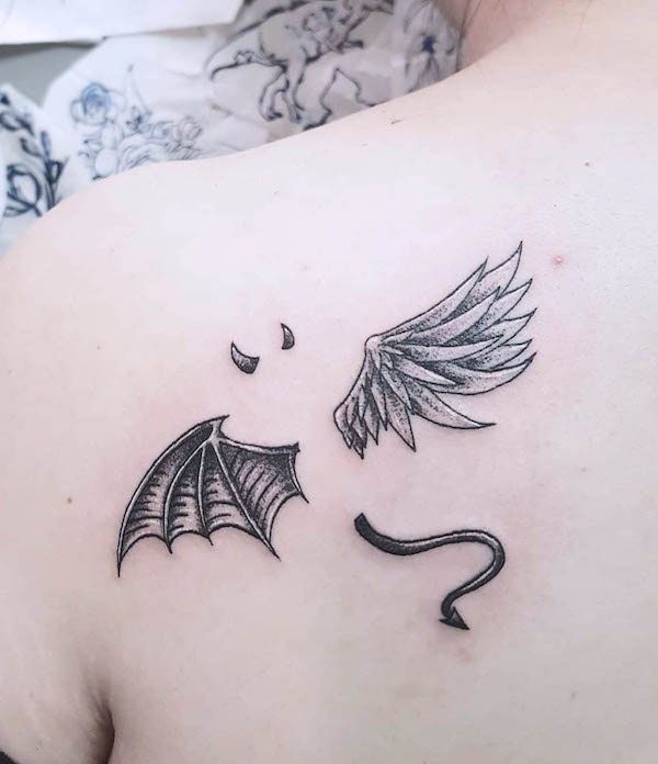 Angel and devil shoulder blade tattoo by @sageinktattoo