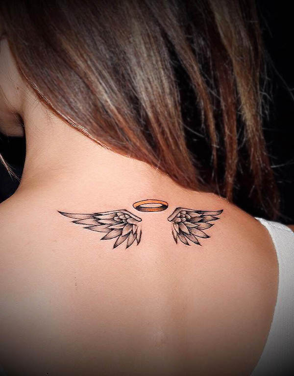 Angel wings neck tattoo by @samh_tattoo