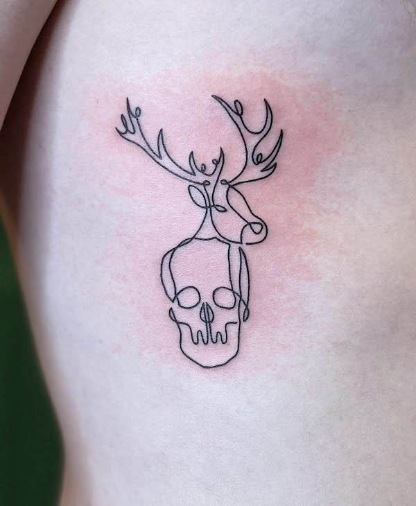 Antler and skull one-line tattoo by @jennaloredo_tattoo