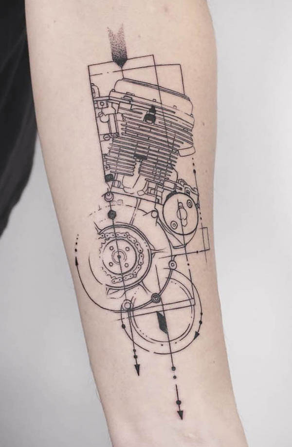 Arrow and motorcycle engine tattoo by @patricetattoo