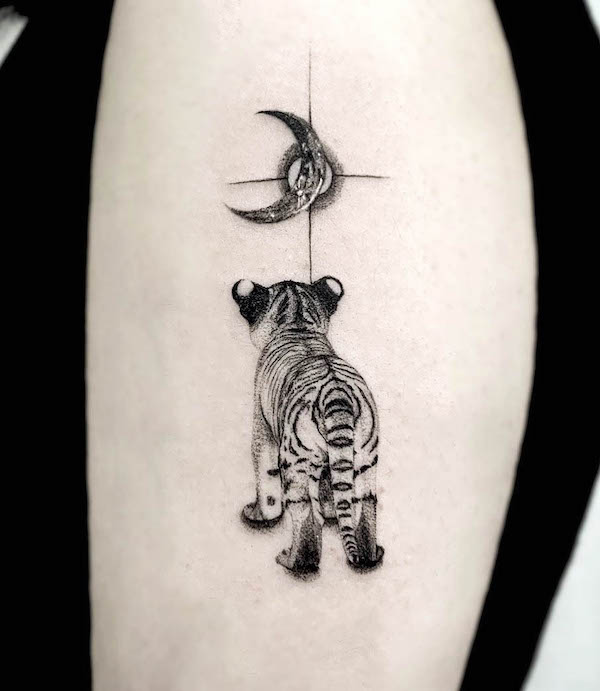 Baby tiger and sun and moon tattoo by @tattooist_hoji