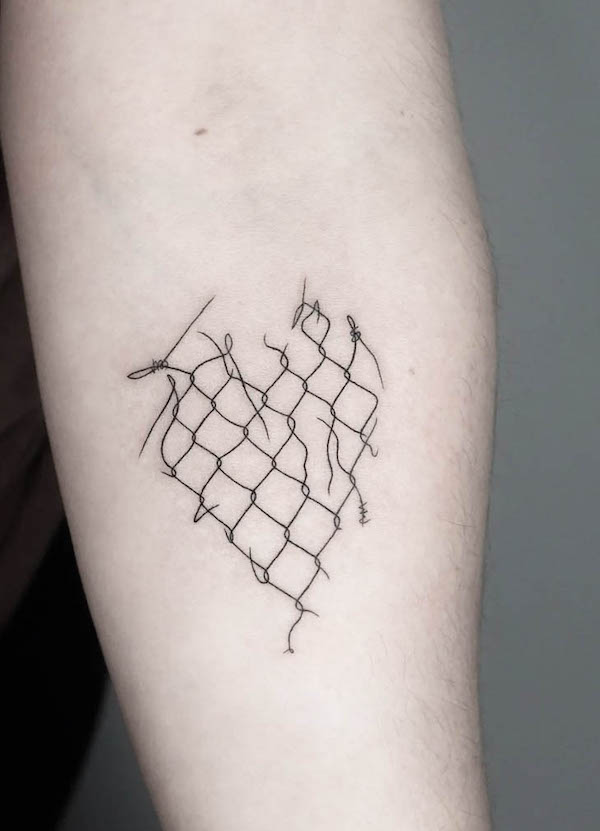 Barbed wire heart tattoo by @whitestarling.tattoo