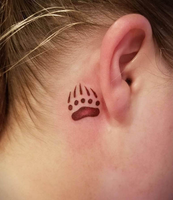 Bear paw behind-the-ear tattoo by @inkandpainttattoogallery