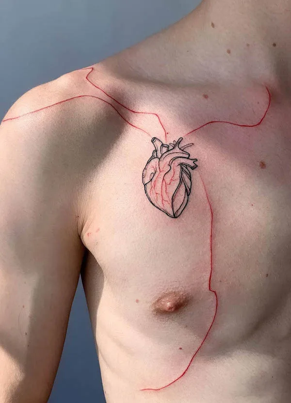 Beating heart tattoo by @sttattoo