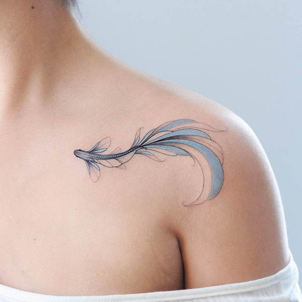 Beautiful blue koi fish collarbone tattoo by @nastyafox