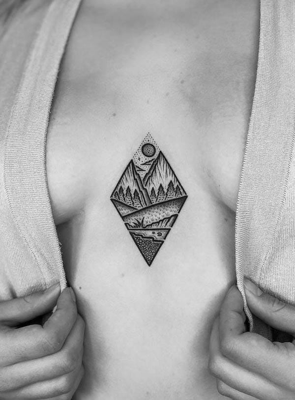 Between the boobs diamond mountain tattoo by @mike_stout_tattoo