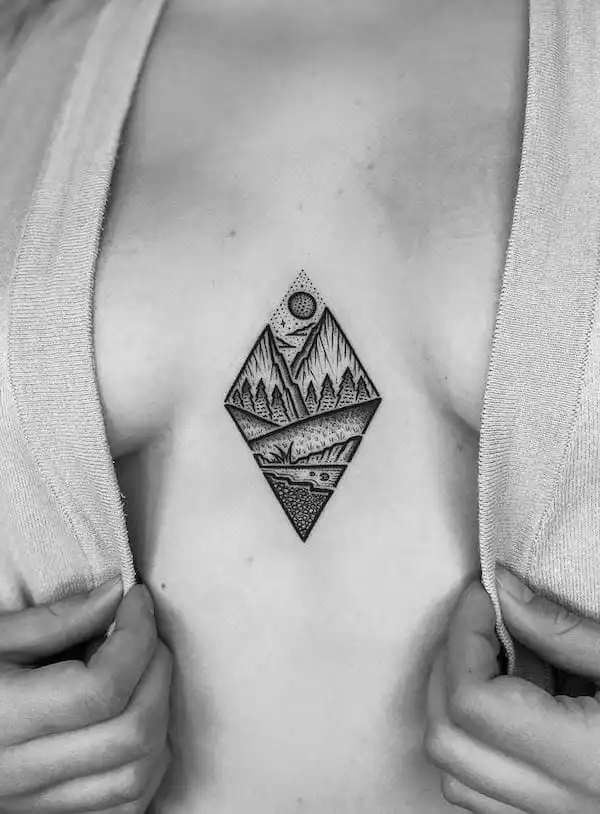 Between the boobs diamond mountain tattoo by @mike_stout_tattoo