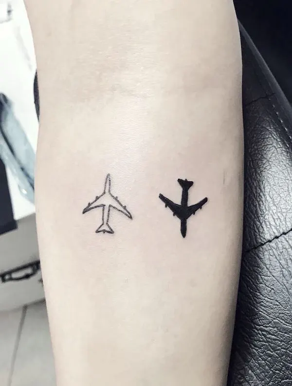 Black and white airplane tattoo by @jperales.tattoo