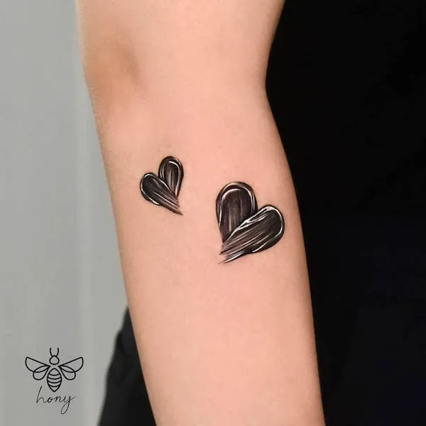 Black hearts forearm tattoo by @_rony_tattoo