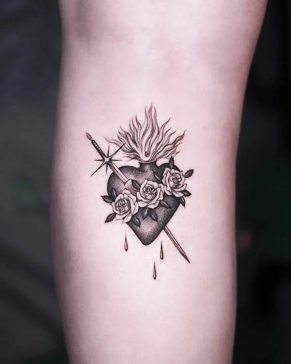 Bleeding heart tattoo by @its_banzo