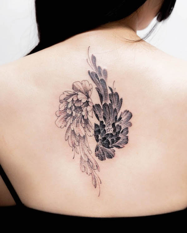 Blooming flowers yin yang tattoo by @tattooistlynn