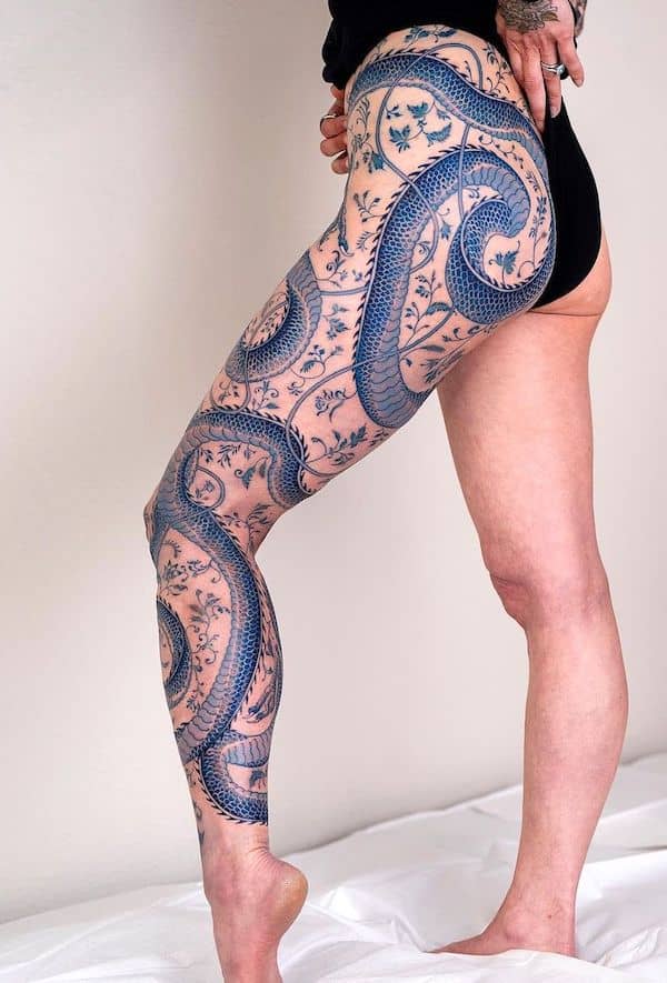 Blue dragon full leg tattoo for women by @oozy_tattoo