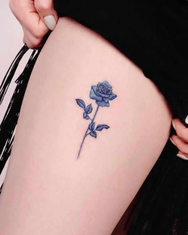 Blue rose thigh tattoo by @peria_tattoo