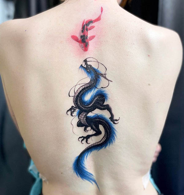 Bold dragon and koi fish tattoo by @eiji_tattoo