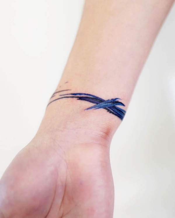 Brushstroke bracelet tattoo by @9room_tattoo