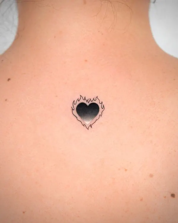 Burning black heart tattoo by @o.ri_tattoo