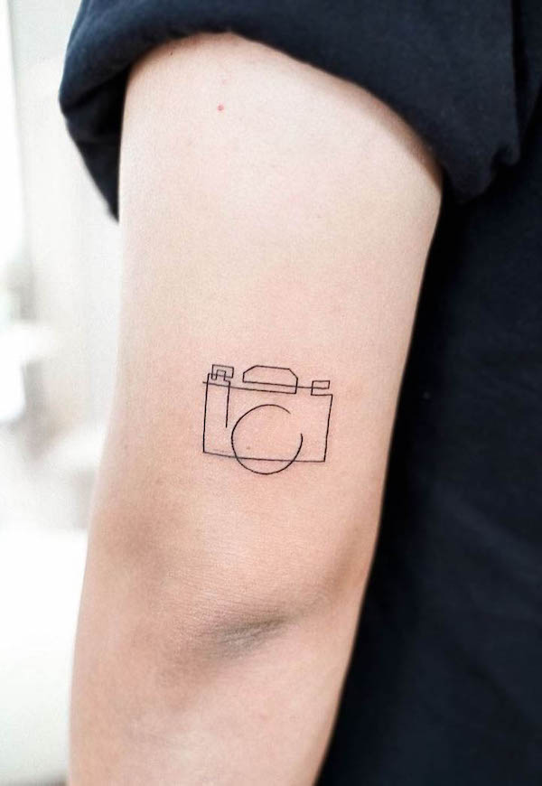 Camera line art tattoo by @xitattoostudio