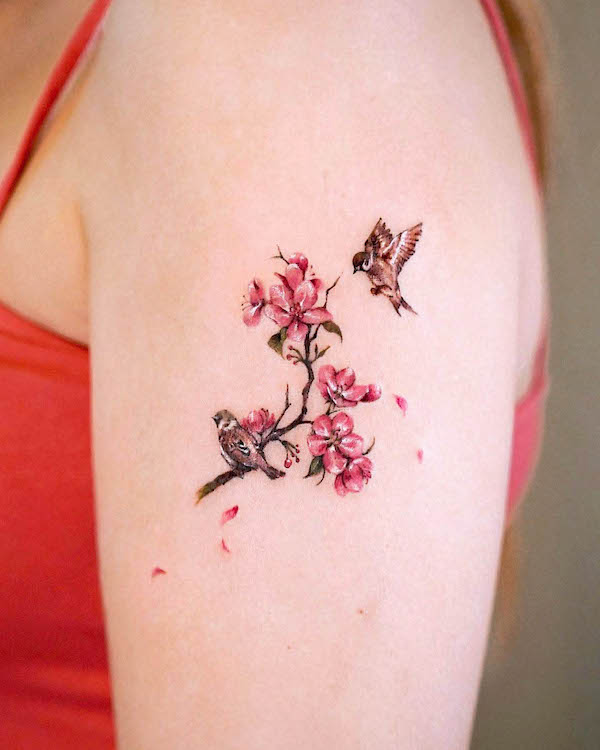 Cherry blossom and sparrows tattoo by @o.ri_tattoo