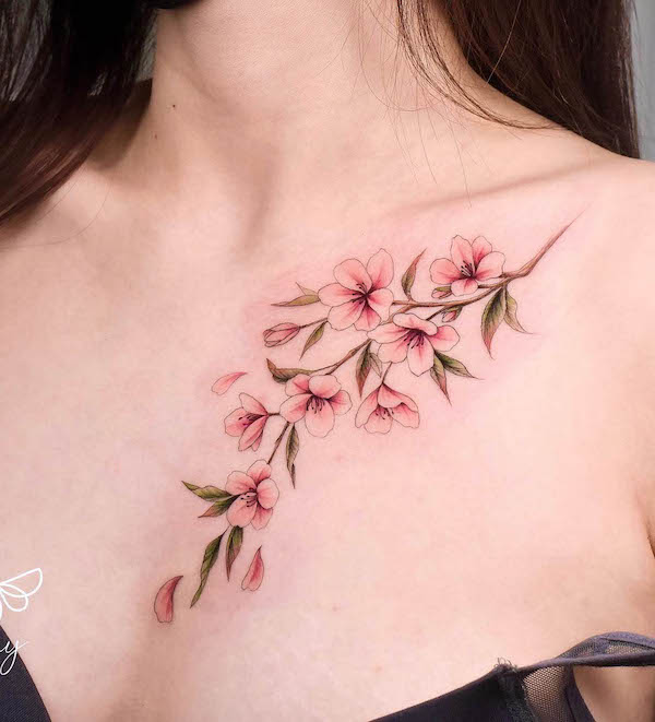 Cherry blossom chest tattoo by @_hony_tattoo