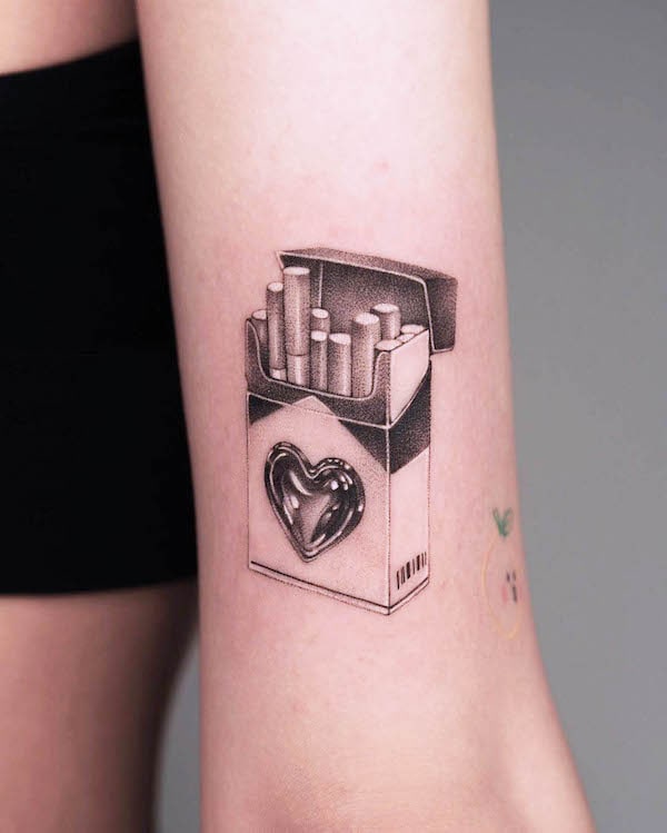 Cigarette and heart tattoo by @ura.ttt