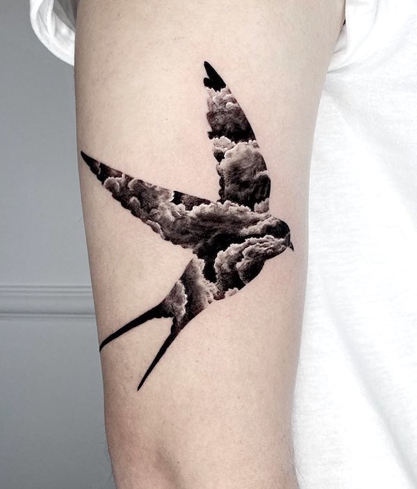 Cloud swallow tattoo by @stiloallday