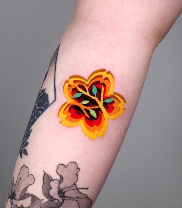 Contemporary cherry blossom tattoo by @zoonmo_