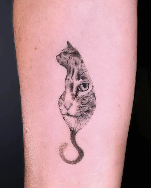 Creative cat tattoo by @tayeh.studio