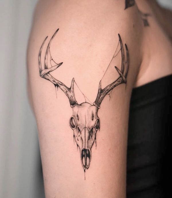 Creepy deer skull sleeve tattoo by @valentino.tattoos