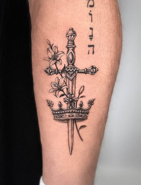 Crown and dagger tattoo by @vic.ink_