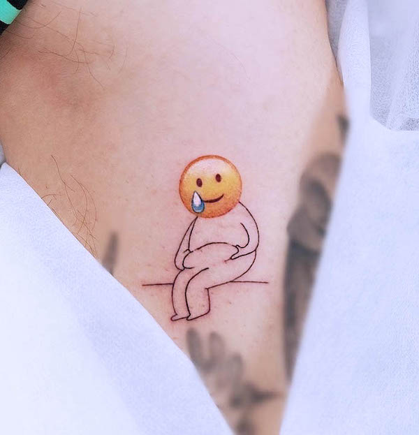 Crying emoji tattoo by @element_inker