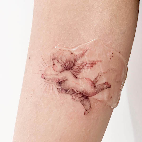 Cute baby angel and sun tattoo by @u.i.tattoo